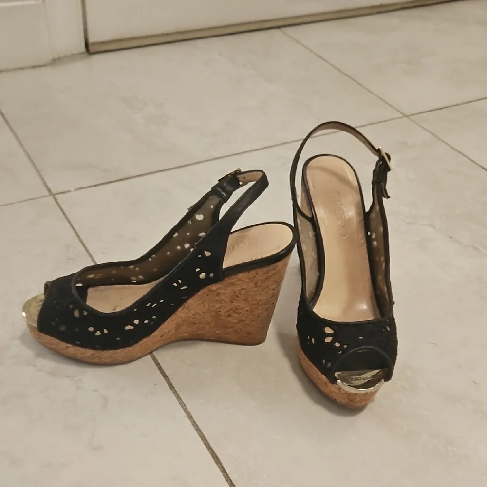 Jimmy Choo Black and Gold Wedges